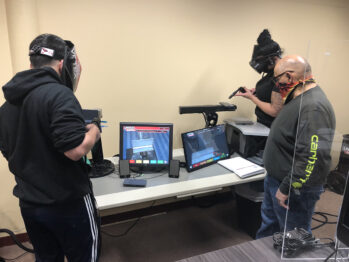 Students using Lincoln Electric VRTEX® virtual reality arc welding trainers.